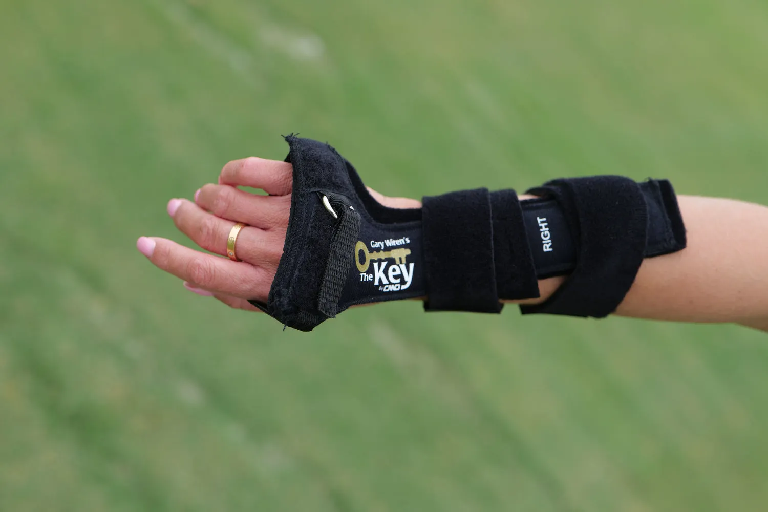 Key Golf Wrist Brace by Gary Wiren. Full Swing Golf Training Aid