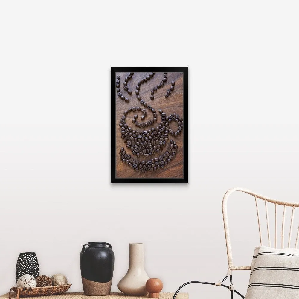 "A cup of coffee illustrated using coffee beans" Black Framed Print